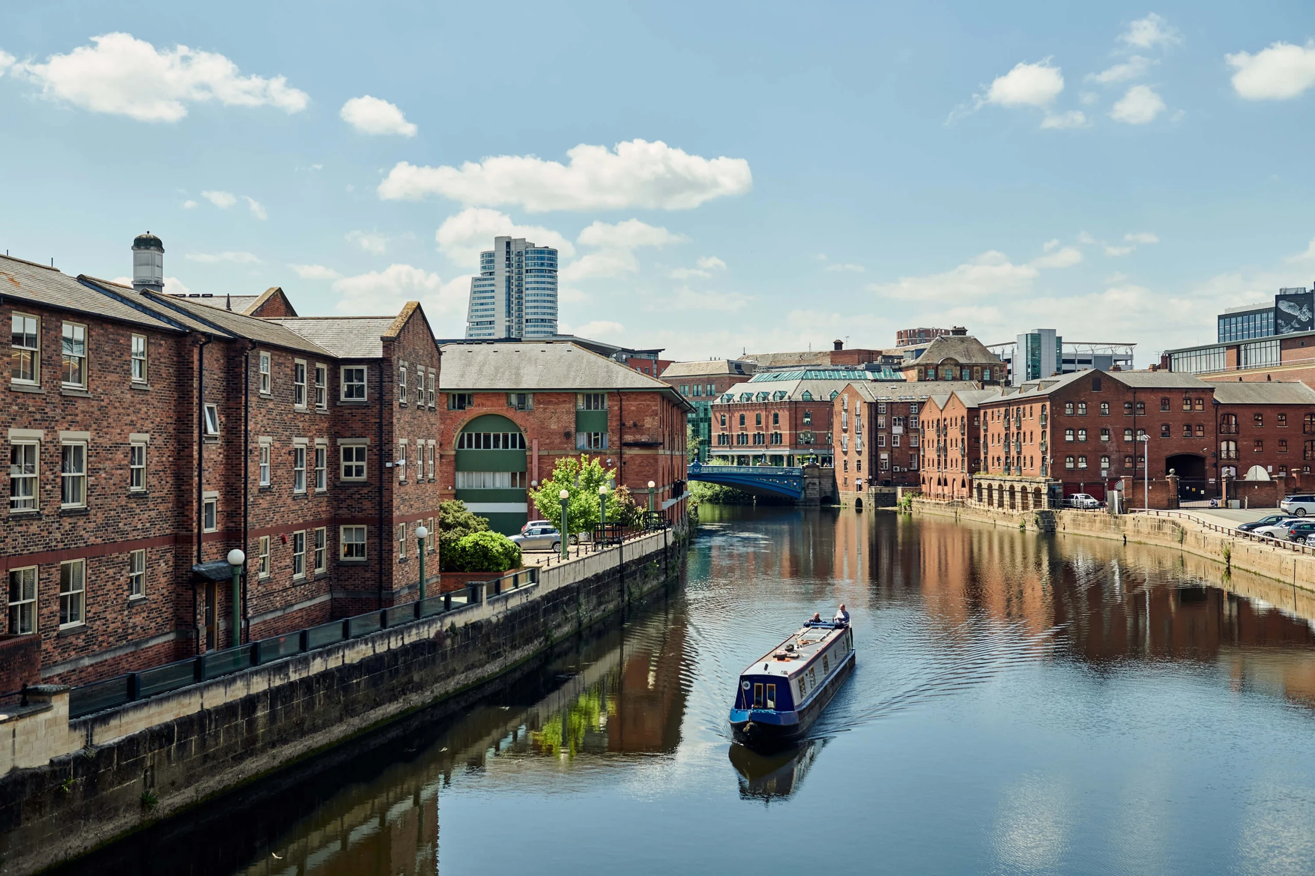 A photo of at boat on the river on a sunny day