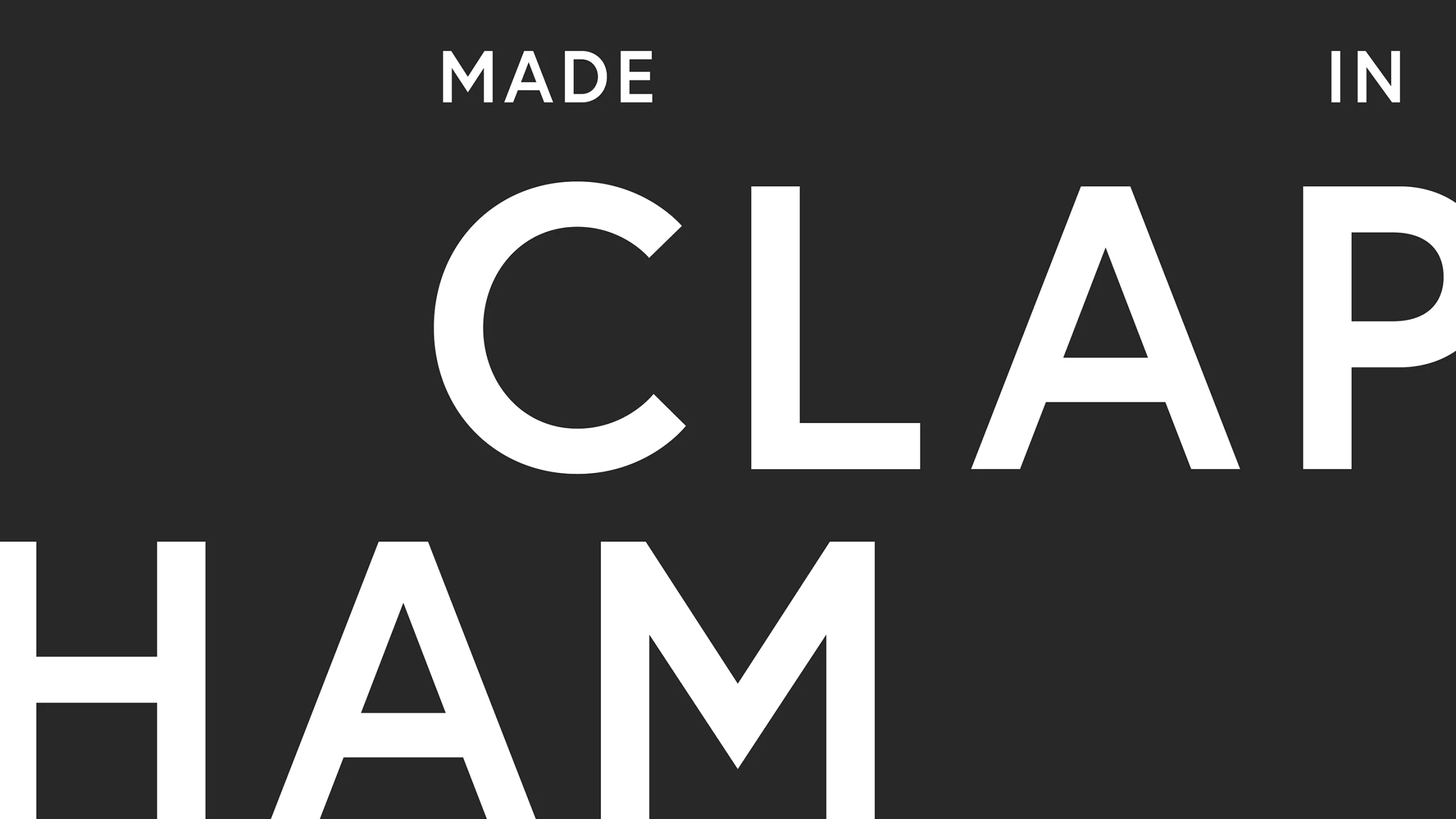 "Made in Clapham" in white on a black background