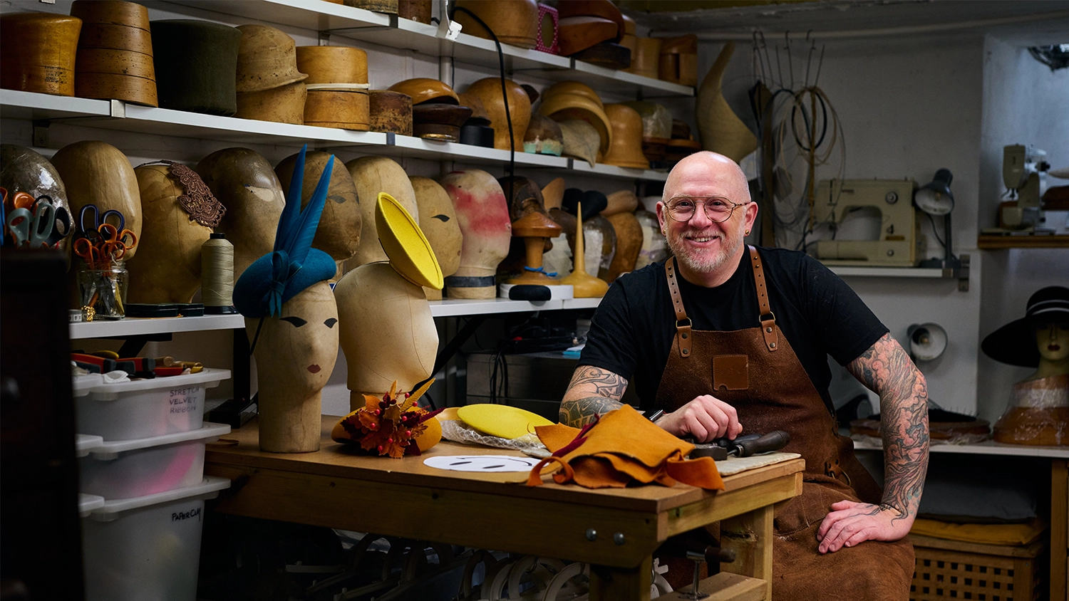 The hat maker to the Queen in his workshop